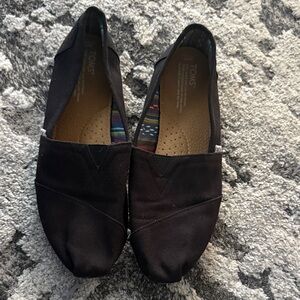 TOMS Classic Black Canvas Slip-Ons